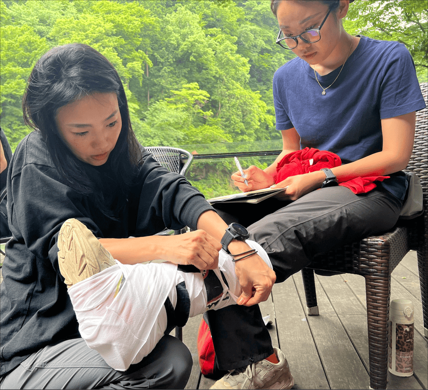 Student practicing an ankle splint in a WMTC course.